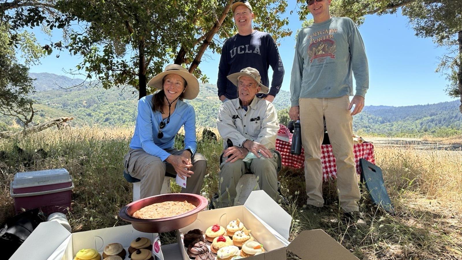 Hal Tenant and family pose with birthday treats