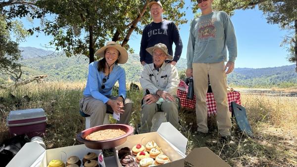 Hal Tenant and family pose with birthday treats